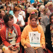 People sit in the audience for the national apology to victims of forced adoptions